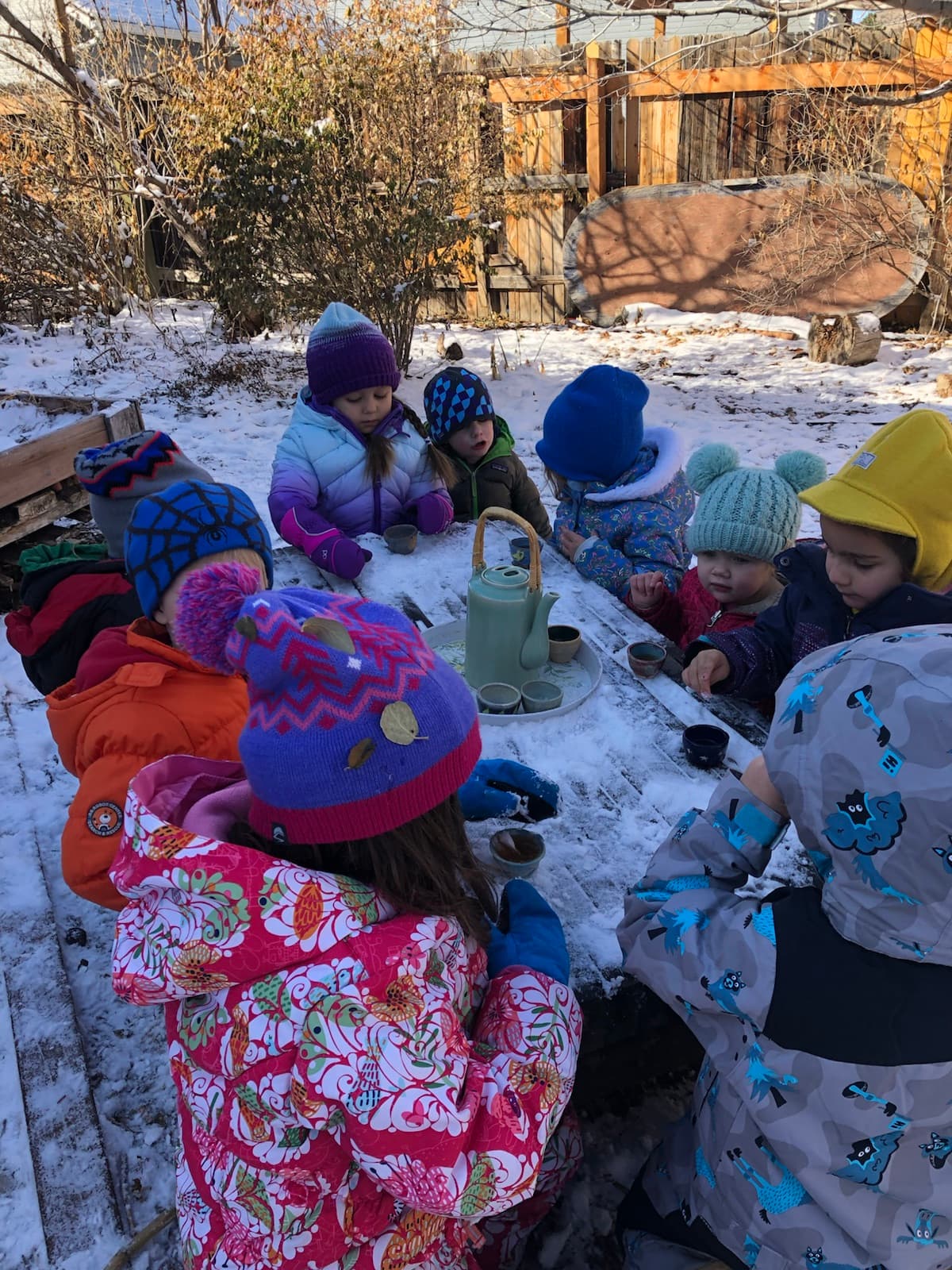 Warm tea poured for the whole table, even on a snowy morning